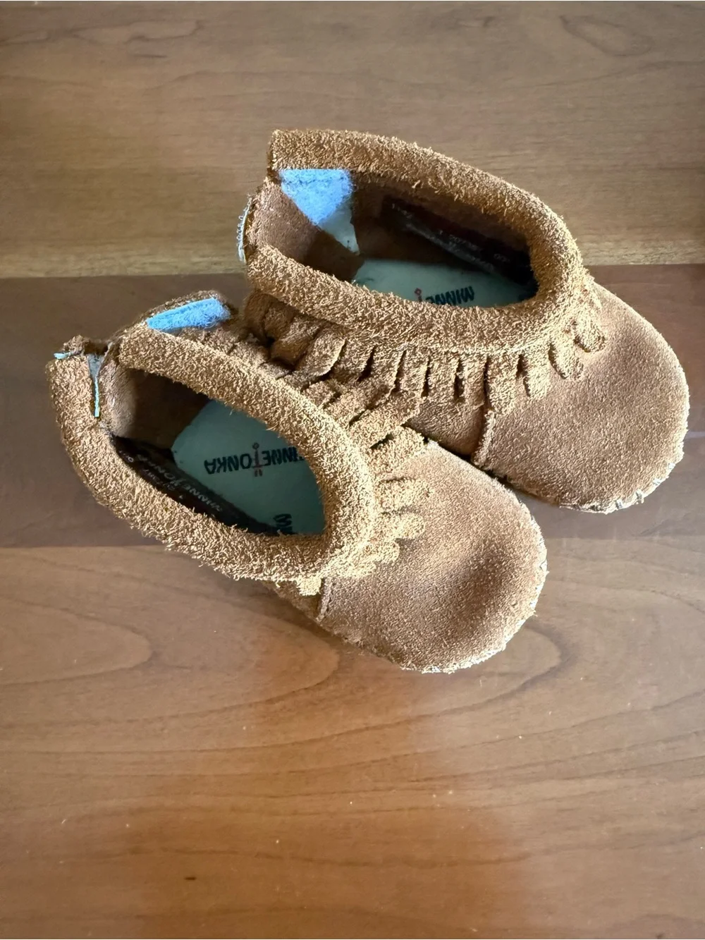 Minnetonka Kids Suede Fringe Moccasins in Brown
